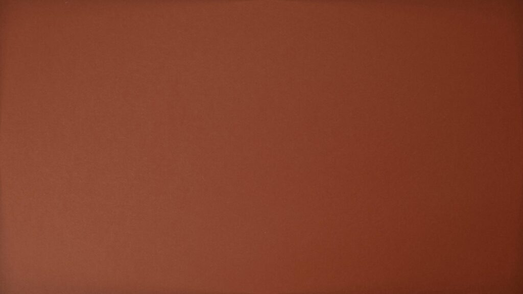 A simple plain brown background ideal for design and copy space needs.